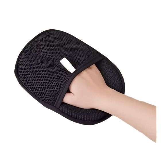 Pet hair remover mitt in use